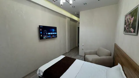 Bir kishilik lyuks: Smart TV va oromkursi